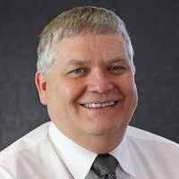 Dr. John Coyne